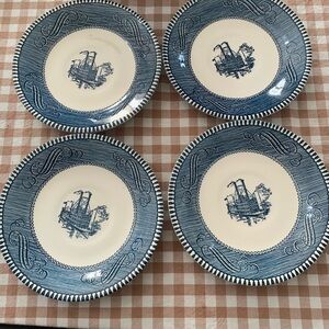 Vintage Royal China Currier & Ives "Steamboat" blue and white ceramic saucers.